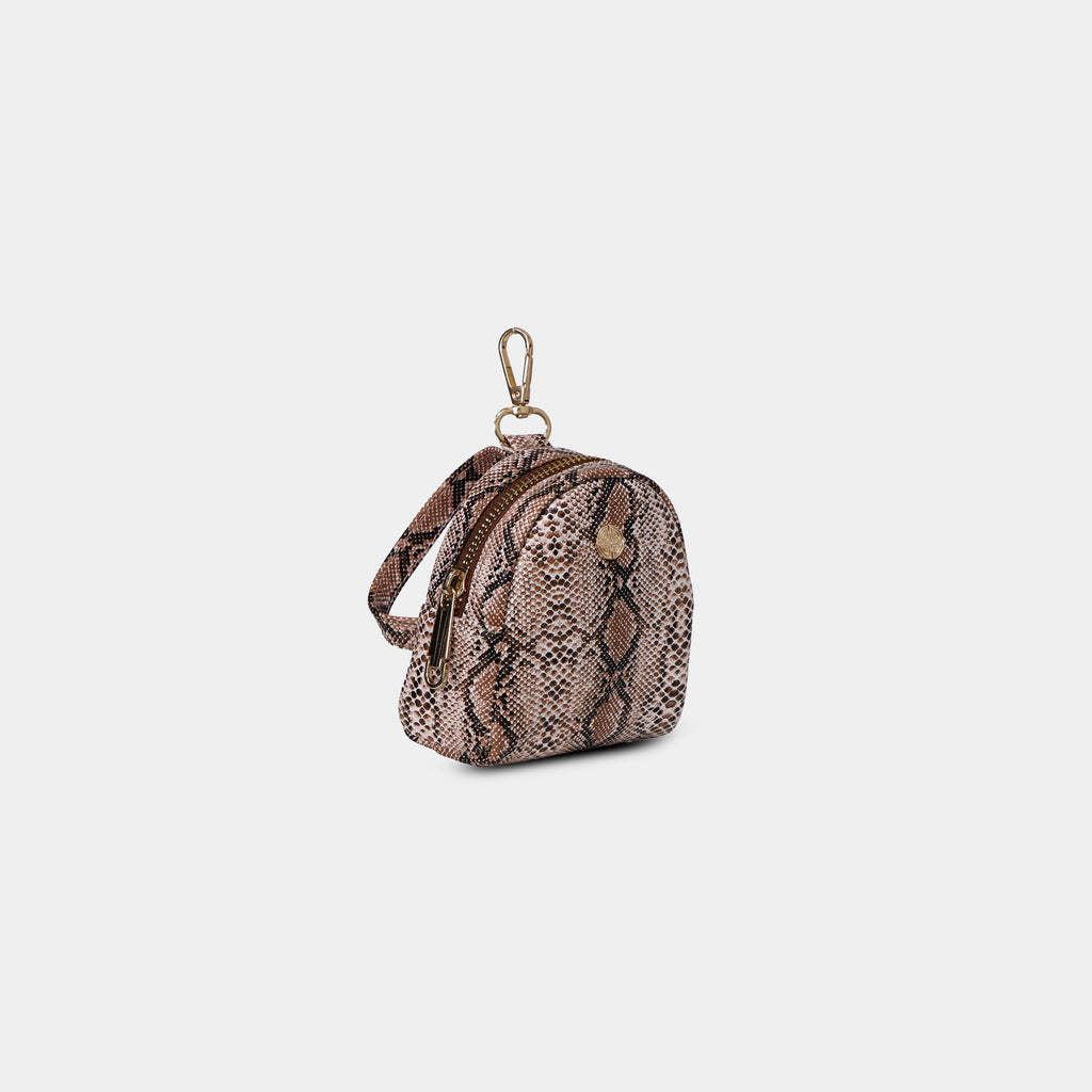 Side profile of Purpleberry Viper brown snake print mini backpack