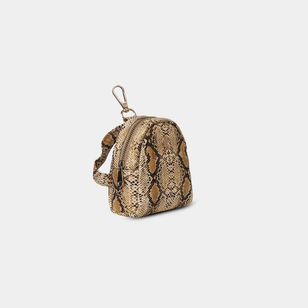 Side profile of Purpleberry Viper yellow snake print micro backpack pouch