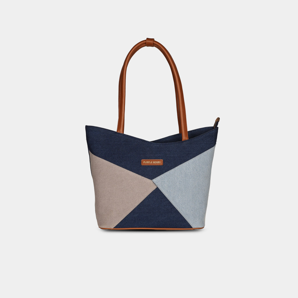 Yuvati geometric blue denim handbag with multi-tone patchwork panels