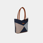 Side view of geometric blue color-block denim handbag