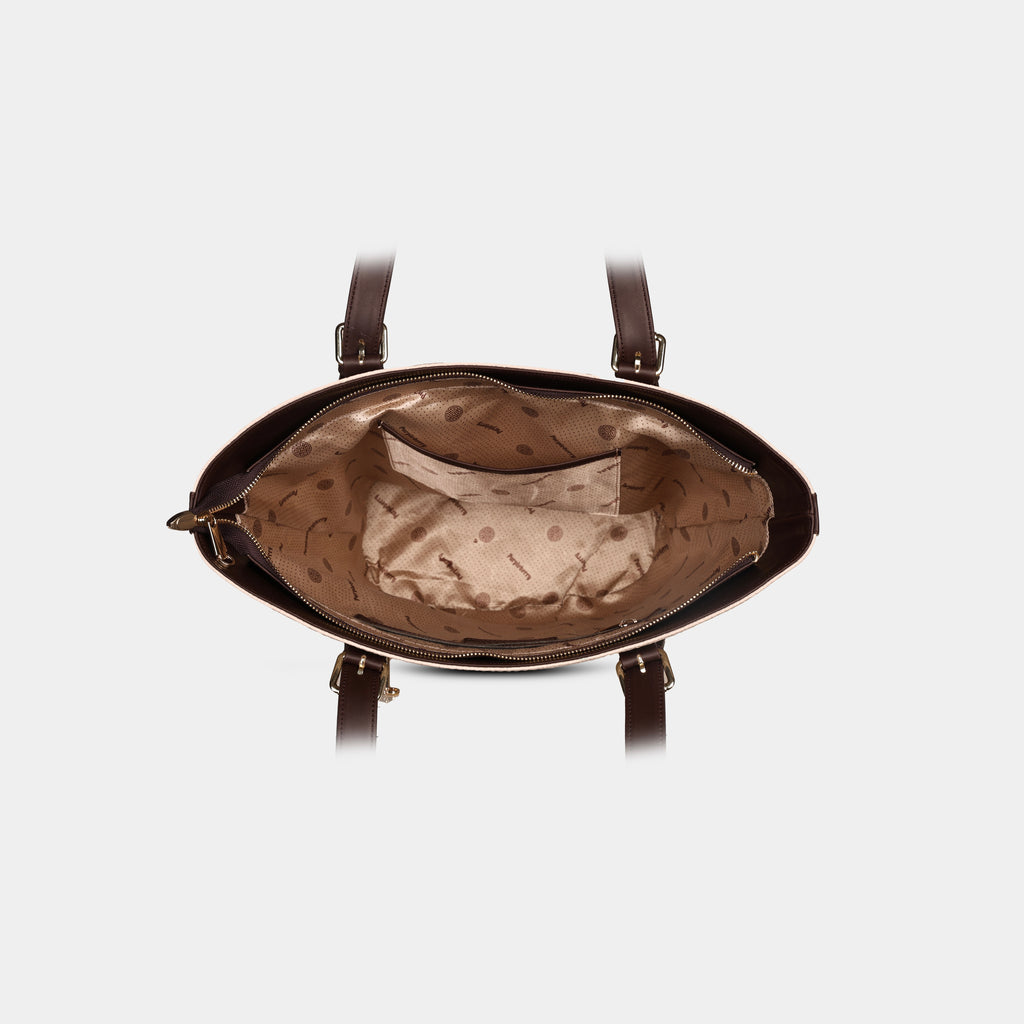 Interior view of beige Siena woven handbag showing spacious lined compartment with zipper and slip pocket