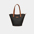 Purpleberry Siena woven faux leather handbag in black with matching shoulder straps – front view highlighting flared design