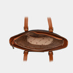 Interior compartment of black Siena woven faux leather handbag with inner zipper pocket and slip pocket