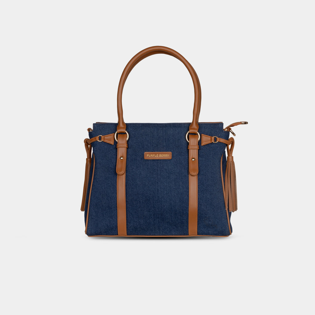 Purpleberry Tassel Denim Handbag in deep navy blue with tan vegan leather trims and structured top handles 