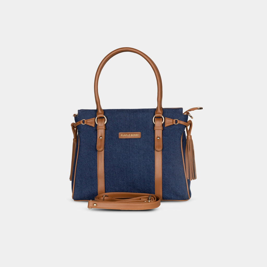 Deep navy Tassel Denim Handbag with detachable shoulder strap and tan leather accents