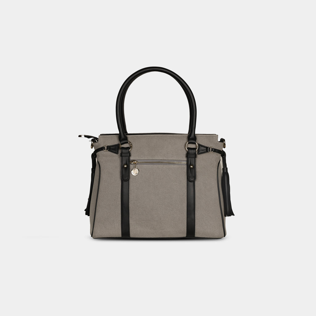 Back view of light grey denim handbag featuring secure zipper pocket
