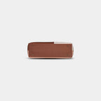 Bottom of Terra pink office tote featuring protective metal studs