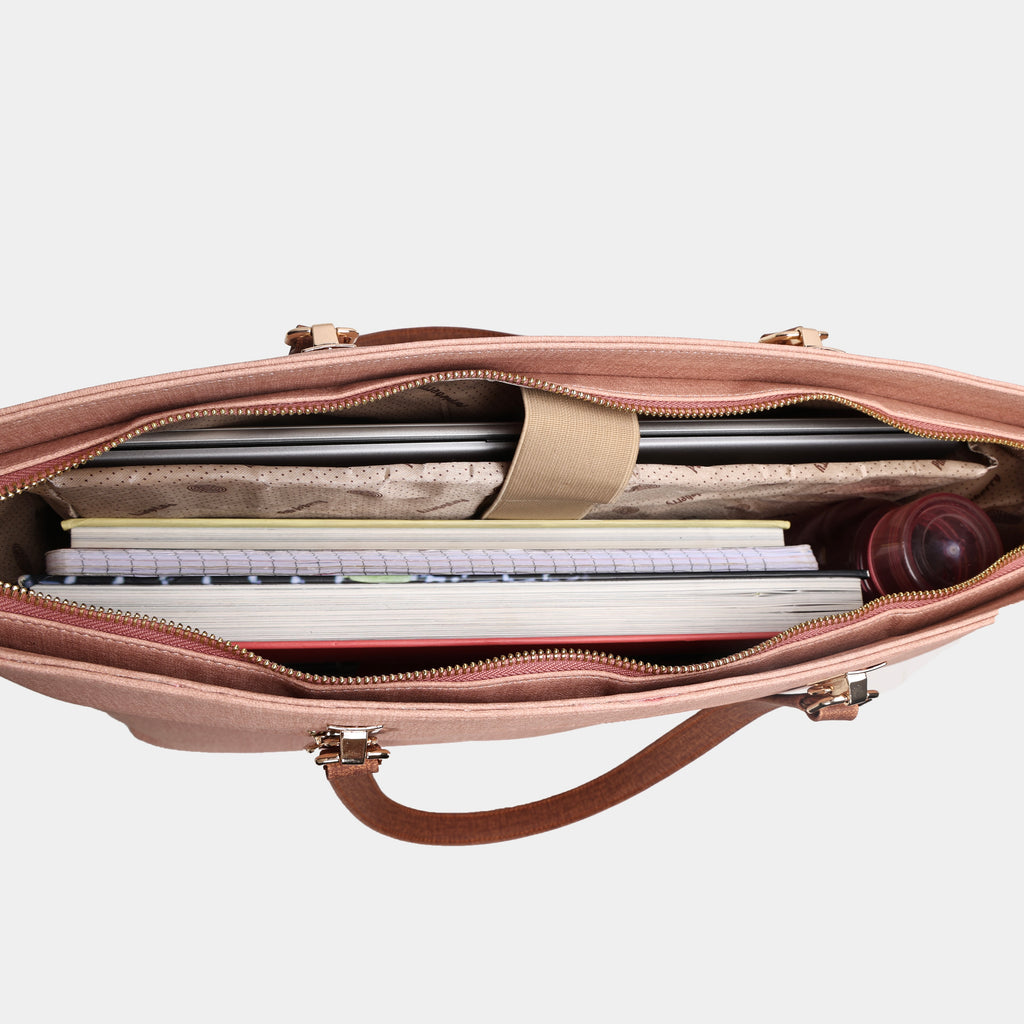 Woman carrying Terra geometric pink office tote for daily work commute